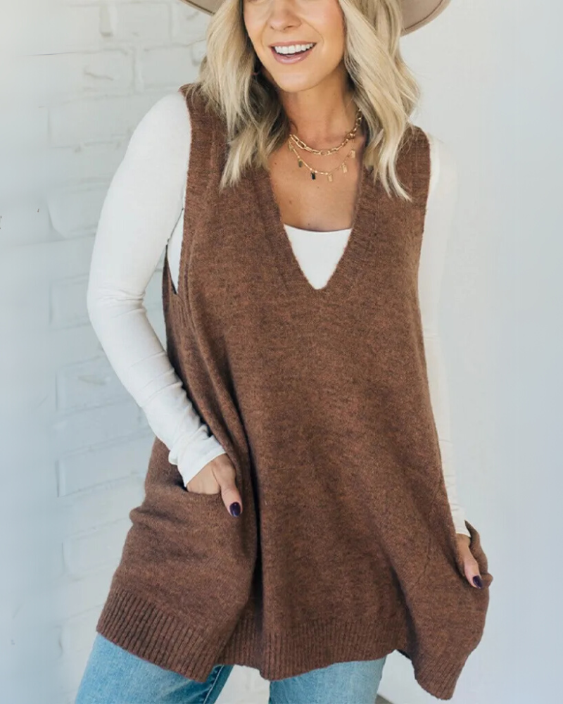 Women's cozy A-line layering vest with pockets, ideal for fall & winter style.