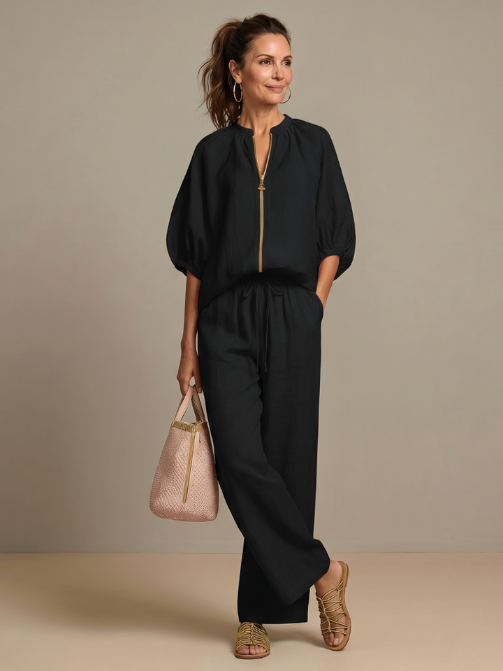 Stylish women's casual wear set: zip front blouson top & comfortable wide leg pants for daily fashion.