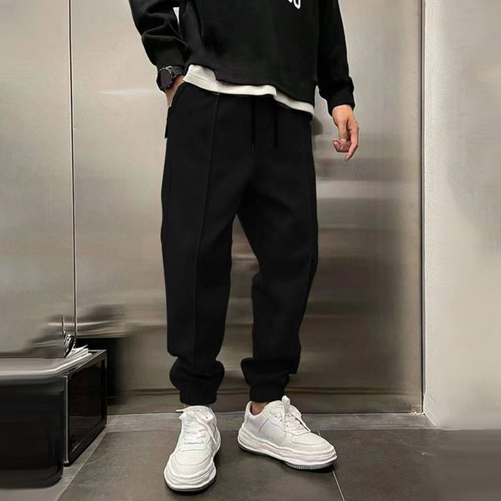 Modern men's relaxed fit trousers, designed for versatile fashion and a comfortable smart casual look.