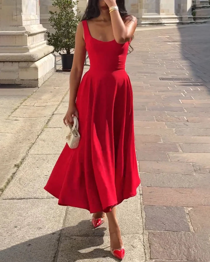 Stylish women's red fitted midi dress, a chic strappy design for fashion-forward summer or evening looks.