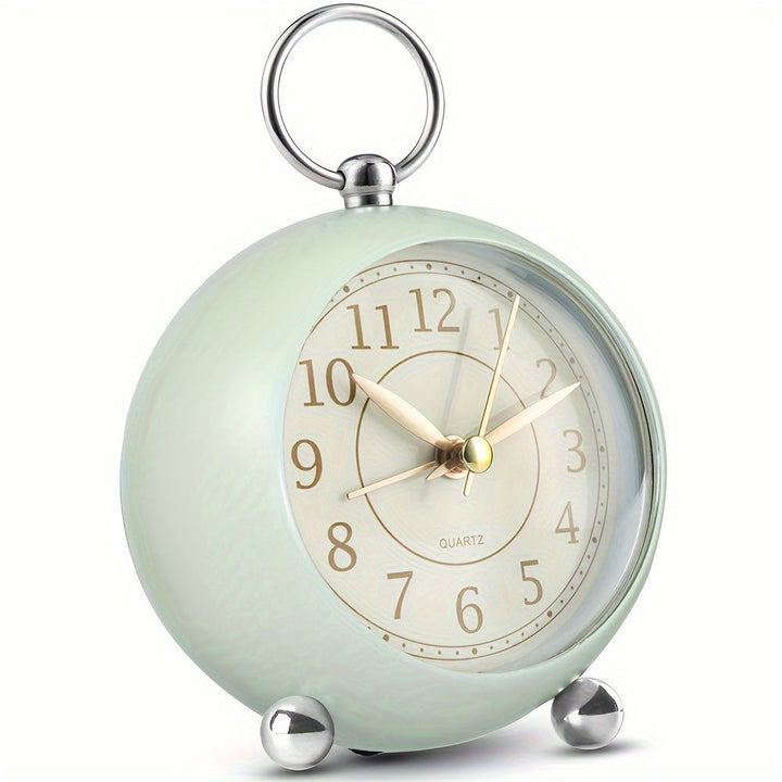 Black retro analogue alarm clock. Clearly readable numbers, quiet sweep, and convenient night light.