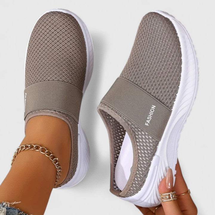 Women's pain relief sneakers with wide sole for daily comfort & support.