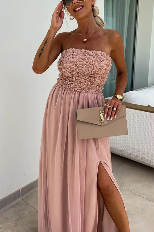 Pink women's sleeveless maxi dress with a high slit. Elegant summer style, perfect for special occasions.