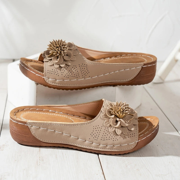 Woman wearing casual women's orthopedic wedge sandals, enjoying everyday comfort, support, and style.