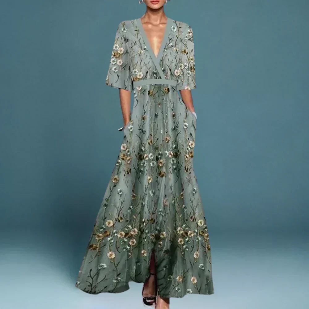Elegant blue floral maxi dress for women, flowing & comfortable. Perfect summer occasion dress with feminine style.