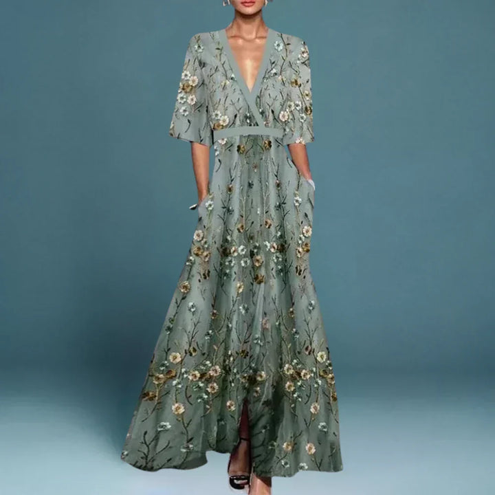 Elegant blue floral maxi dress for women, flowing & comfortable. Perfect summer occasion dress with feminine style.
