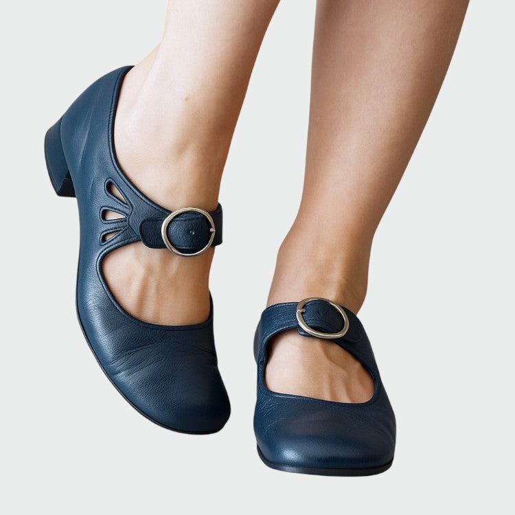 Timeless women's Mary Jane shoes featuring a stylish buckle and comfortable low block heel for classic fashion.