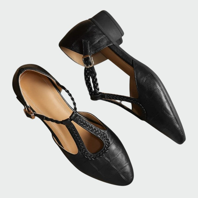 Stylish black pointed T-Bar Mary Jane shoes for women. Ideal elegant footwear for office workwear or evening events.