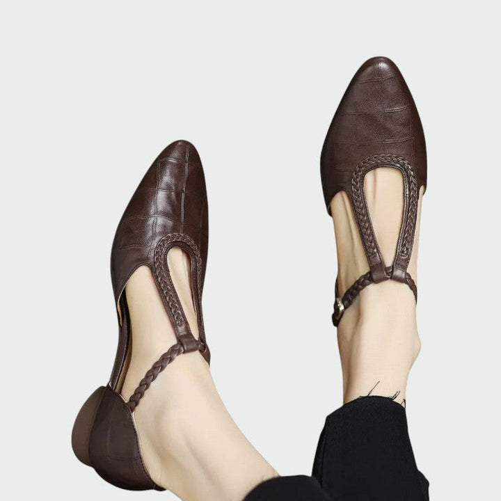 Versatile women's pointed T-Bar Mary Jane dress shoes. Features comfortable block heel, ideal for workwear or evenings.