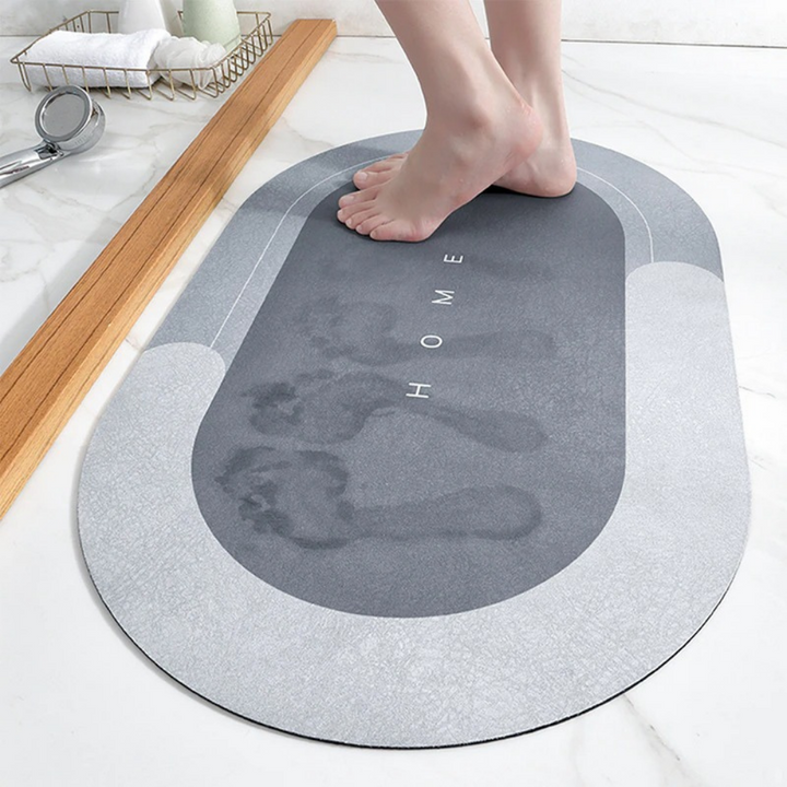 Quick-drying bath mat for modern bathrooms, absorbent & non-slip for safety.
