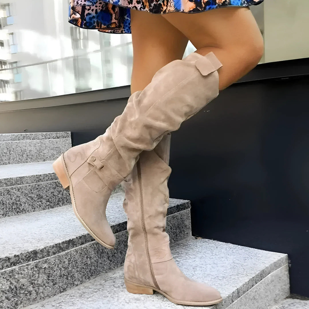 Classic brown women's long high boots, elegant & comfortable for all-day fall and winter wear.