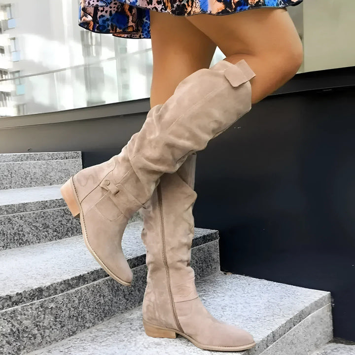 Classic brown women's long high boots, elegant & comfortable for all-day fall and winter wear.