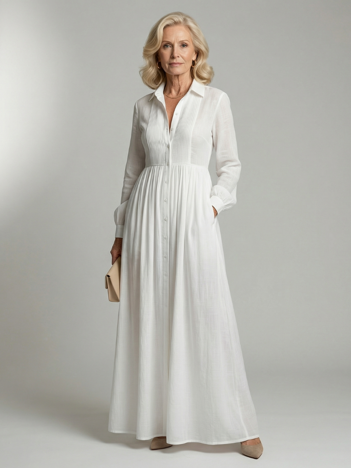 Women's soft flow white maxi dress with long sleeves and button front for effortless spring and summer style.