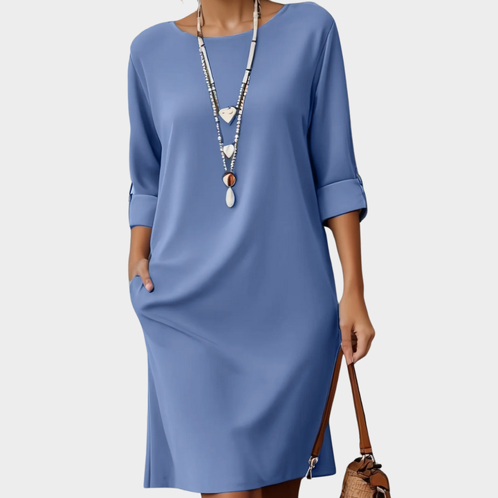 Comfortable women's round neck midi dress, perfect for casual and everyday wear. Versatile spring/summer style.