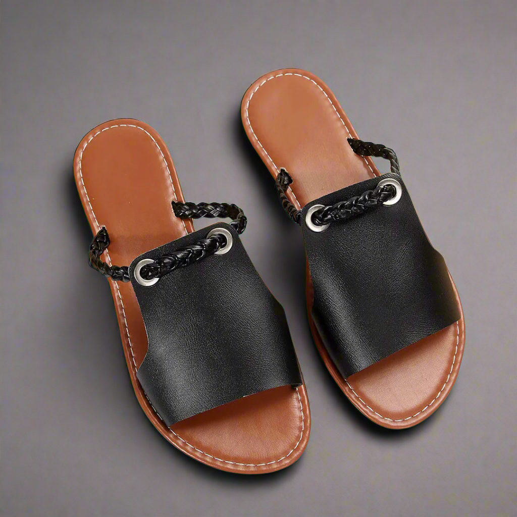 Chic women's flat summer sandals, perfect for comfortable everyday wear, casual style, and vacation.