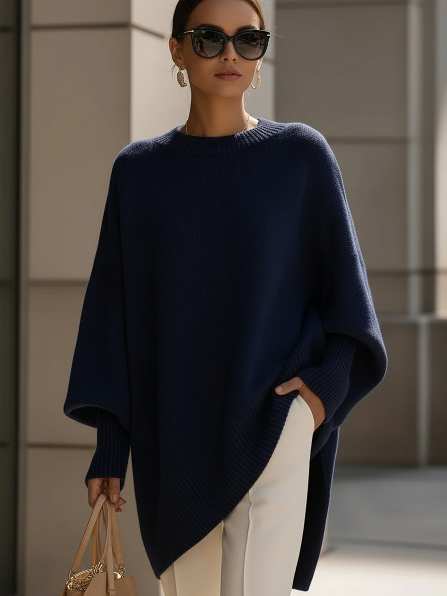 Soft knit long sleeve oversized sweater for women. Relaxed fit, modern style, ideal for cozy winter fashion.