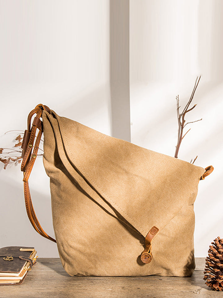 Casual asymmetrical slouchy shoulder bag for women, featuring an adjustable strap for comfort.