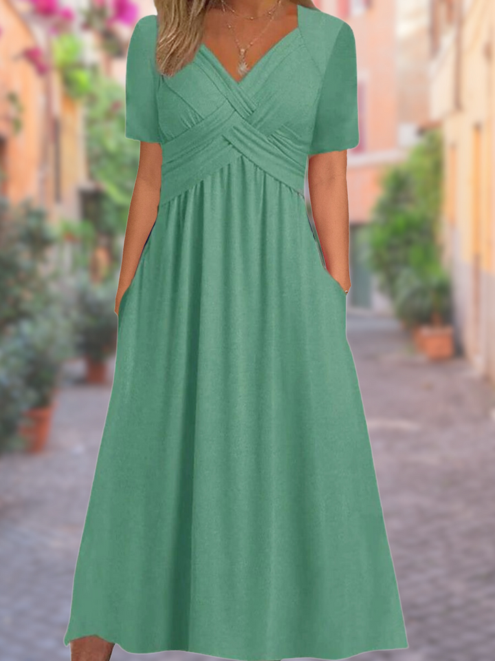 Flattering women's V-neck midi dress with tummy control. Sleeveless, comfortable, ideal for summer & spring style.