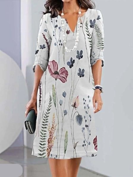 Elegant women's floral print midi dress, comfortable for spring/summer, available in plus sizes.