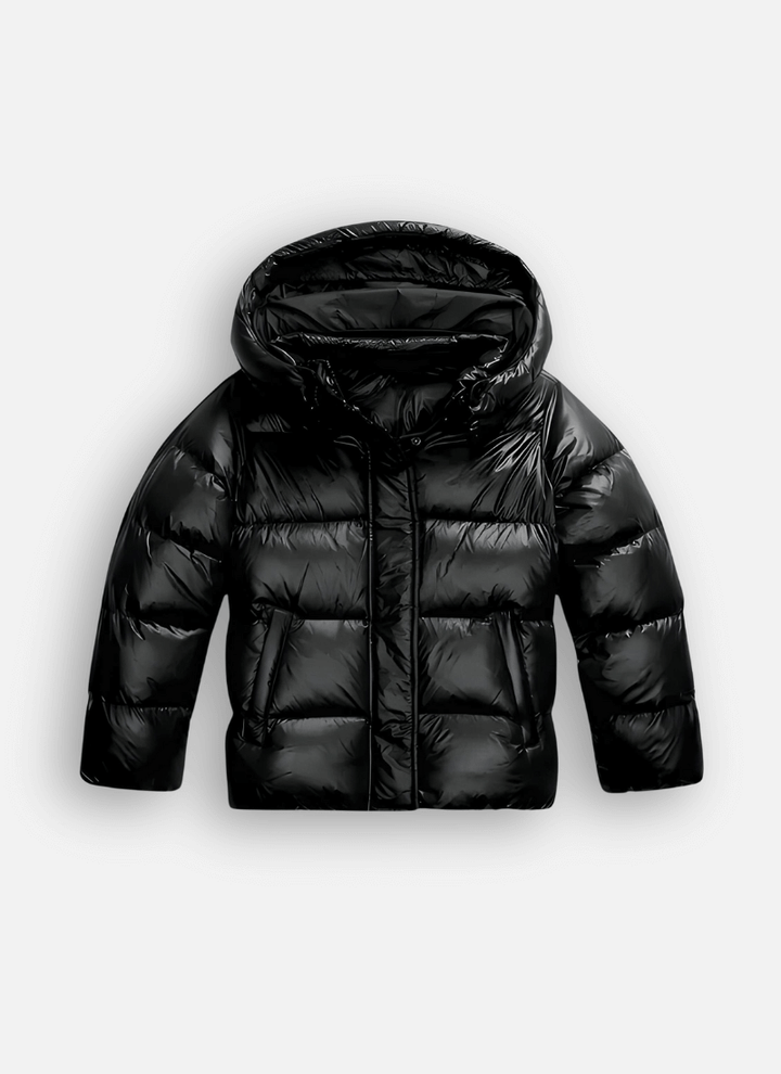 Women's slim-fit puffer jacket with a glossy finish for a warm, stylish winter look. Ideal for cold weather city wear.