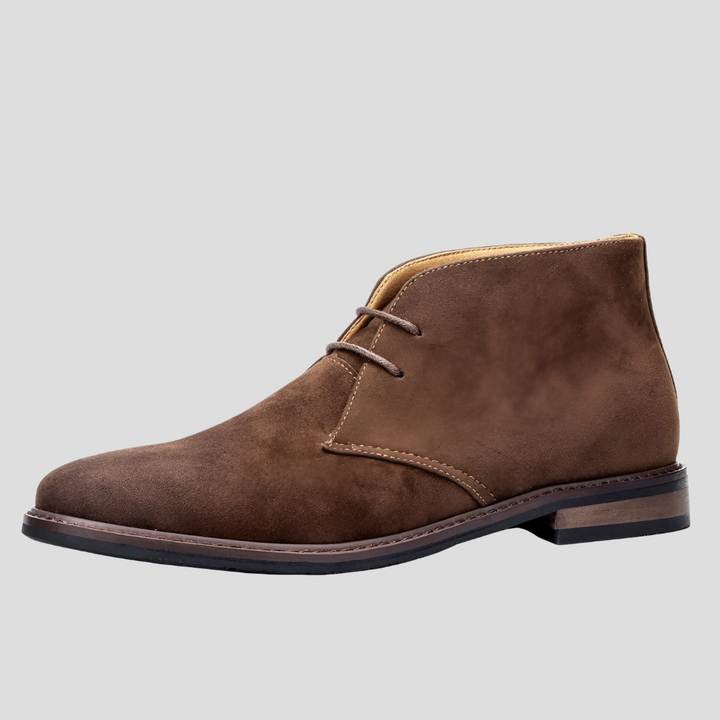 Vintage-style men's desert boots with comfortable lace-up design for classic fashion and everyday wear.