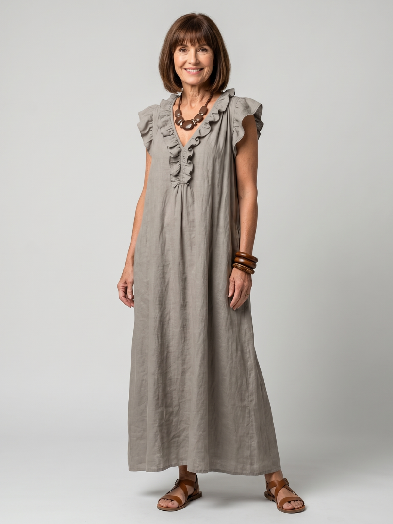 Women's sleeveless ruffle trim midi dress, V-neck, and pockets for summer comfort.