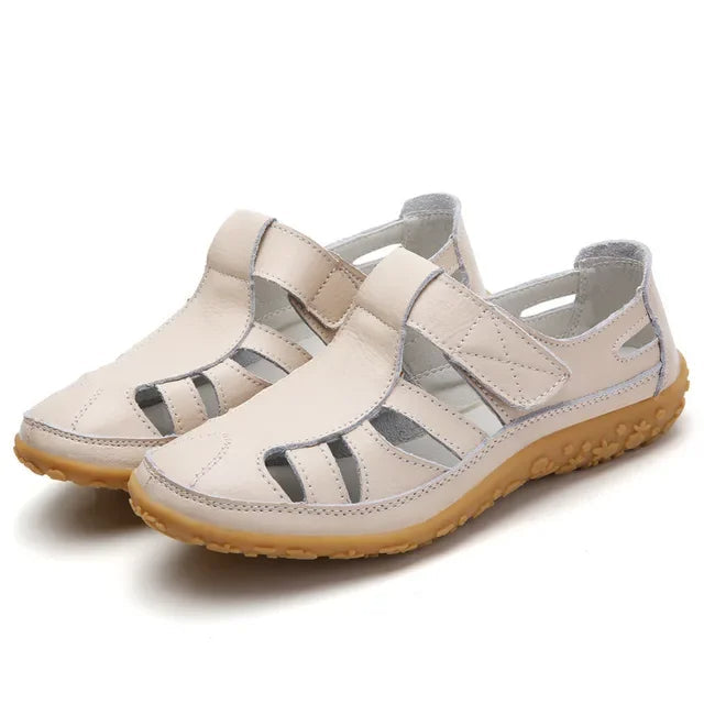 Versatile brown leather women's sandals, adjustable velcro & comfort sole for casual or walking wear.