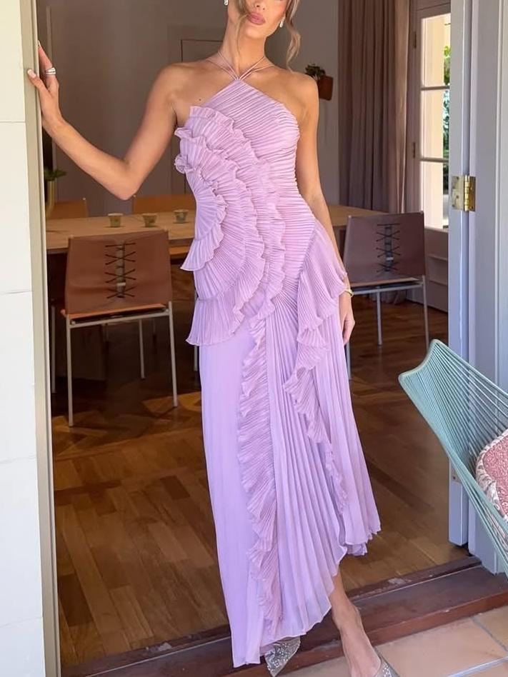 Sleeveless pleated asymmetric maxi dress for elegant wedding guests.