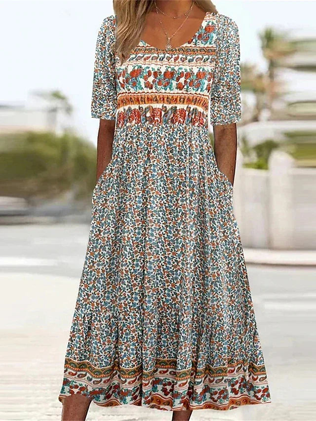 Effortless women's boho midi dress with short sleeves, perfect for summer casual or vacation wear. Flowy, relaxed fit.
