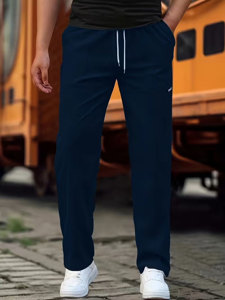 Men's casual straight-leg pants in a versatile neutral color, designed for all-day comfort & everyday wear.