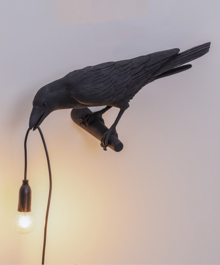 Sculptural crow table lamp, a unique accent light for artistic home decor. Modern bird lamp.