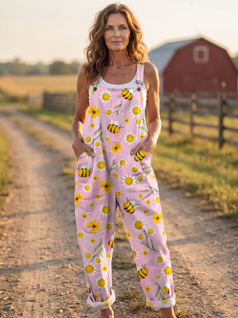 Women's pink floral bloom relaxed fit jumpsuit, perfect for comfortable summer daywear. Effortless casual style.