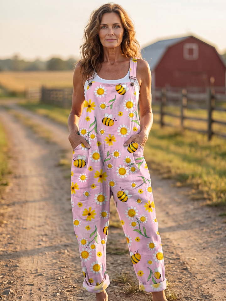 Women's pink floral bloom relaxed fit jumpsuit, perfect for comfortable summer daywear. Effortless casual style.