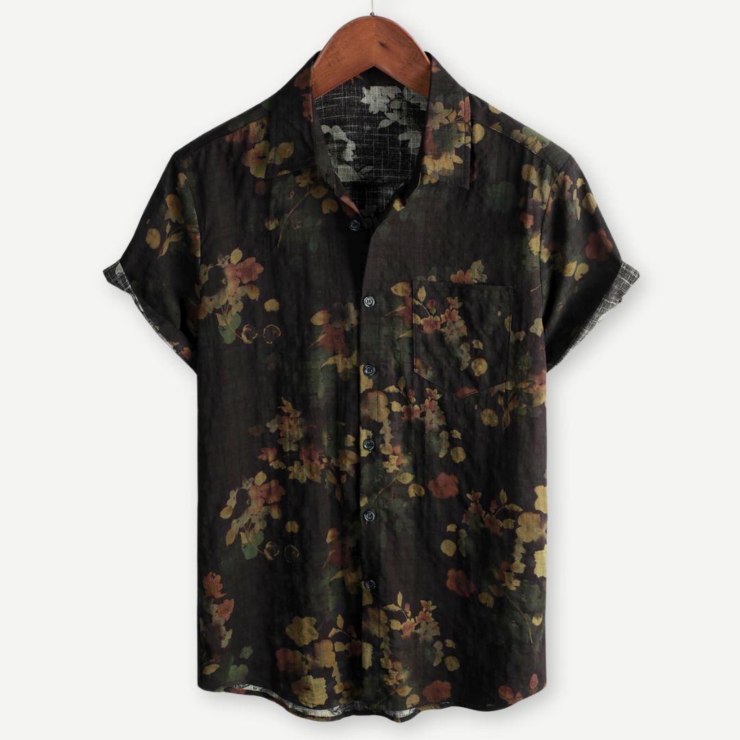 Men's floral relaxed fit shirt with short sleeves, perfect for casual summer wear & vacation style. Printed button-up.