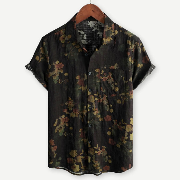 Men's floral relaxed fit shirt with short sleeves, perfect for casual summer wear & vacation style. Printed button-up.