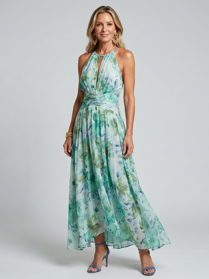 Elegant women's flowy pleated halter floral midi dress, perfect for summer.