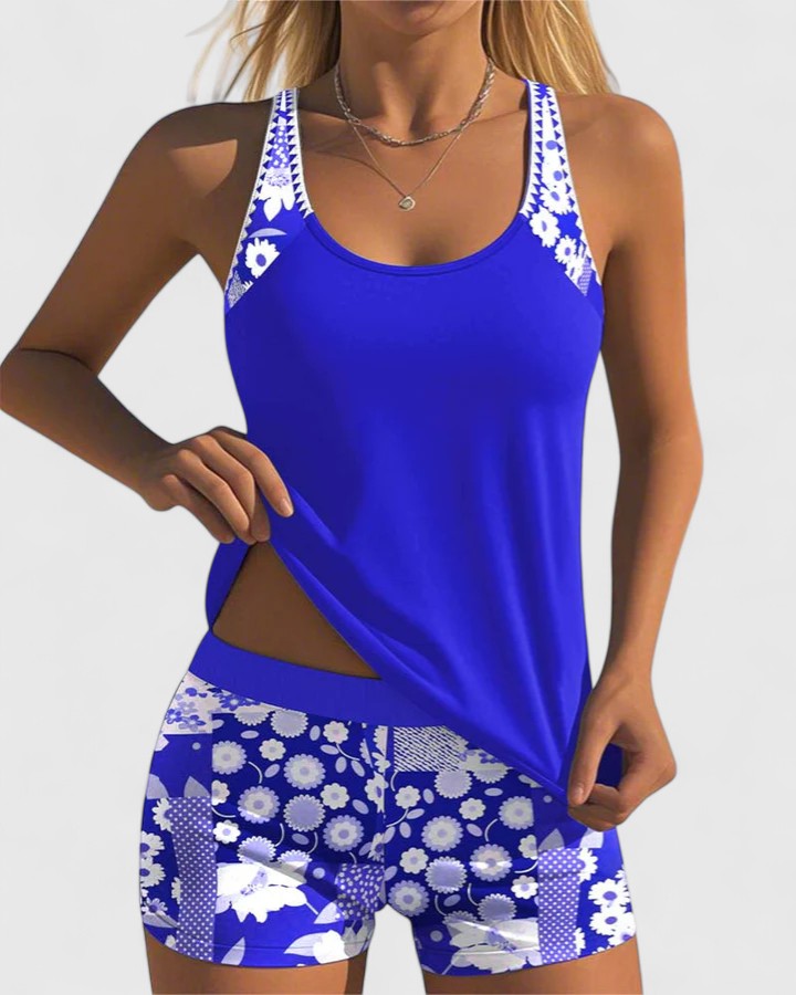 Vibrant floral print women's tankini swimsuit, perfect for summer beachwear and resort vacations.