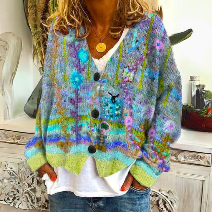 Stylish women's statement sweater, featuring a unique, colorful knit & relaxed fit for vibrant fashion.