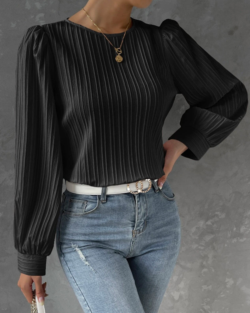 Elegant women's burgundy round neck shirt, a comfortable and stylish addition to any wardrobe.