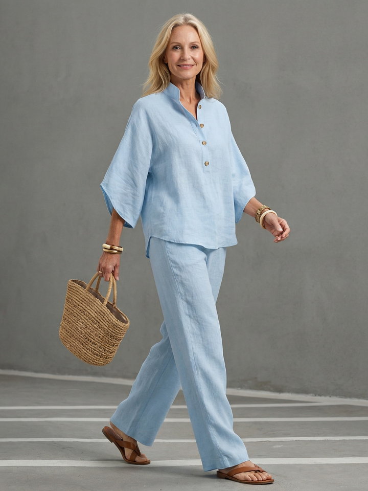 Women's relaxed button front tunic and trouser set for casual everyday wear.