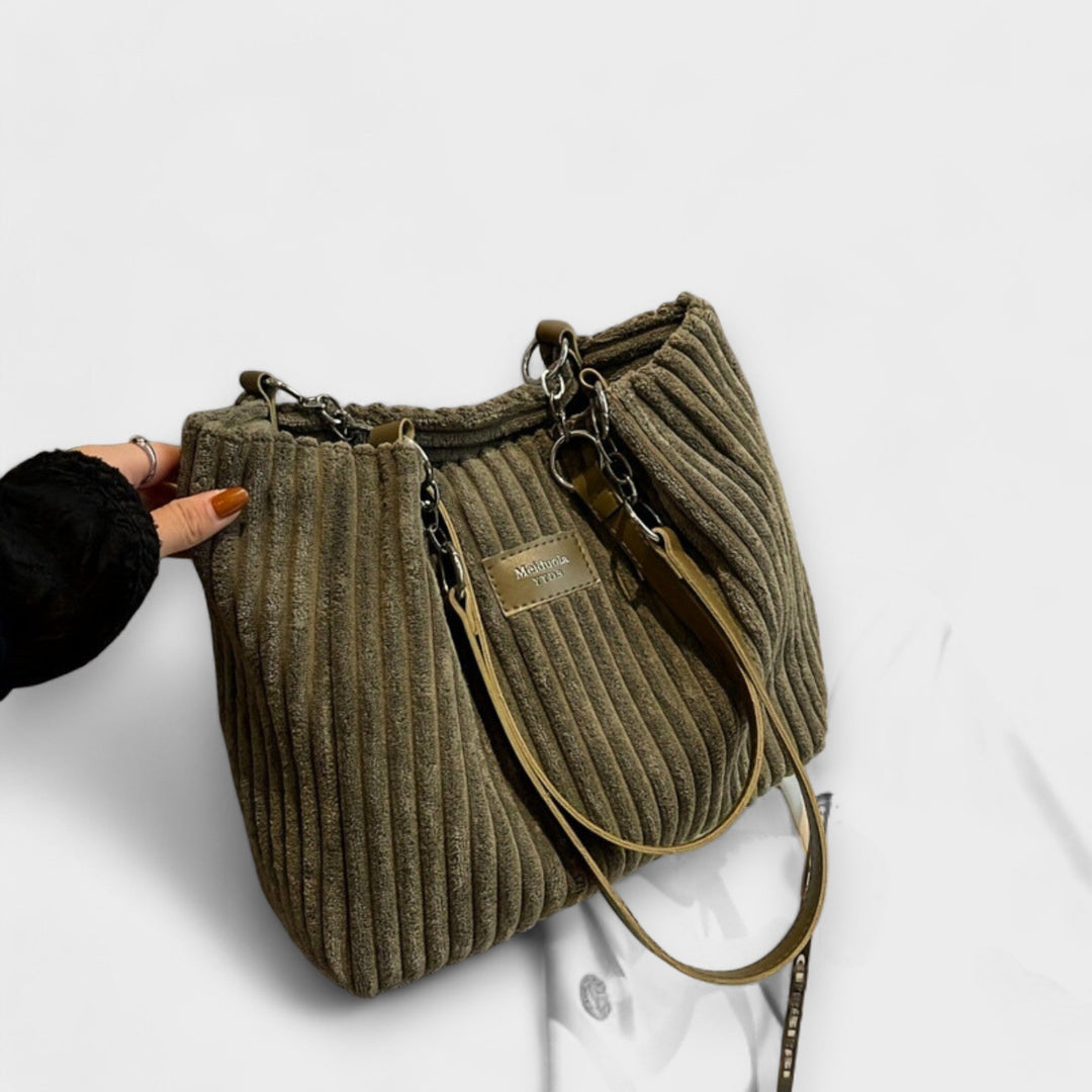 Soft corduroy shoulder bag for women. Casual, stylish everyday fashion accessory with ample space.