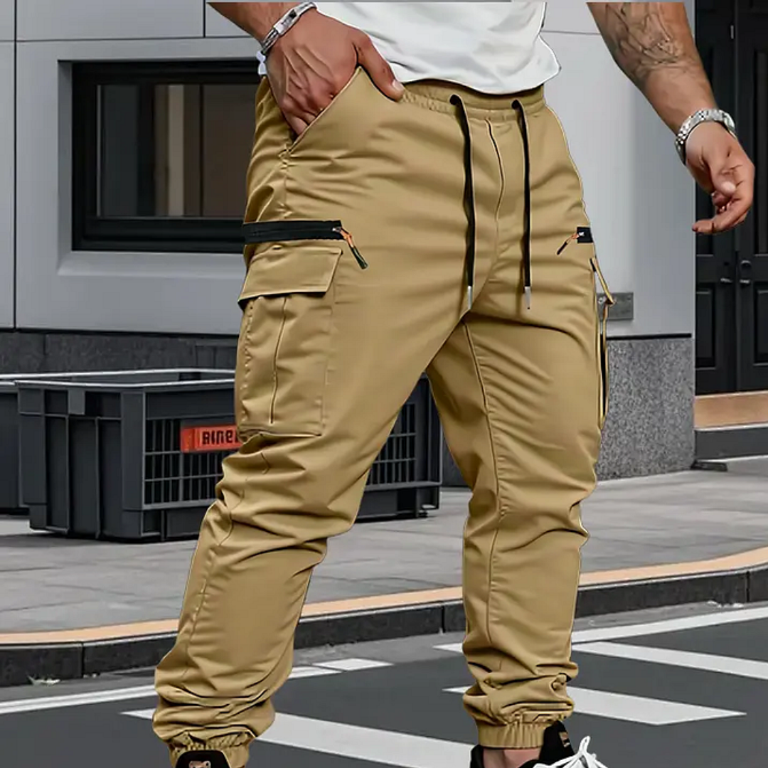 Comfortable men's tapered fit cargo pants in a versatile shade, ideal for all-day comfort and casual outings.