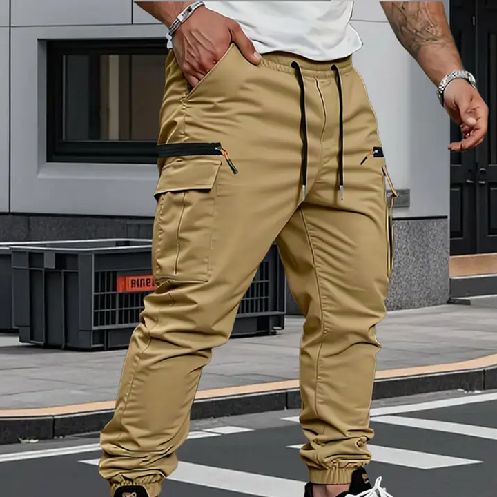 Comfortable men's tapered fit cargo pants in a versatile shade, ideal for all-day comfort and casual outings.
