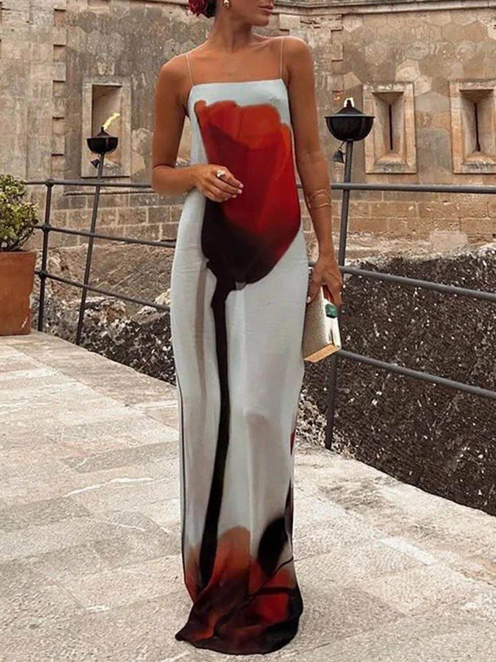 Women's flowy abstract print maxi sundress; effortless summer style.