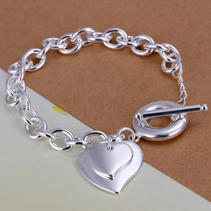 Women's delicate 925 sterling silver chain bracelet, perfect everyday accessory. Elegant wrist jewelry for her.