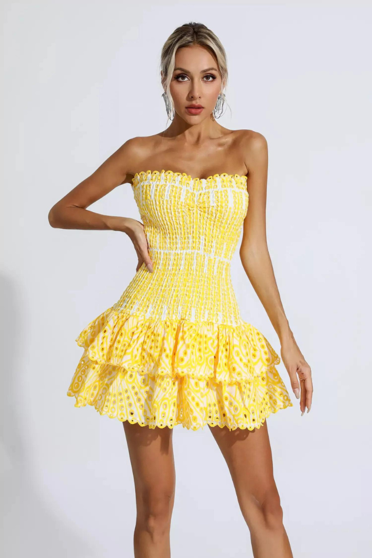 Modern women's elegant strapless ruffle mini dress, a must-have for special occasions.