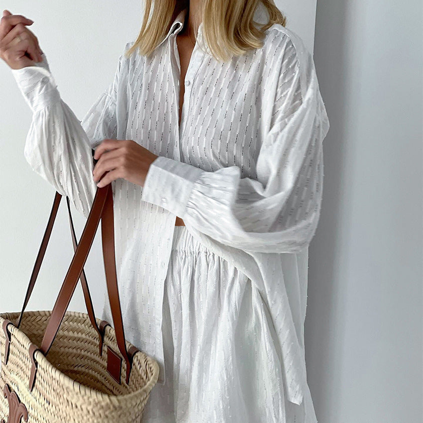 Close-up of intricate broderie detail on the stylish women's summer two-piece outfit set.
