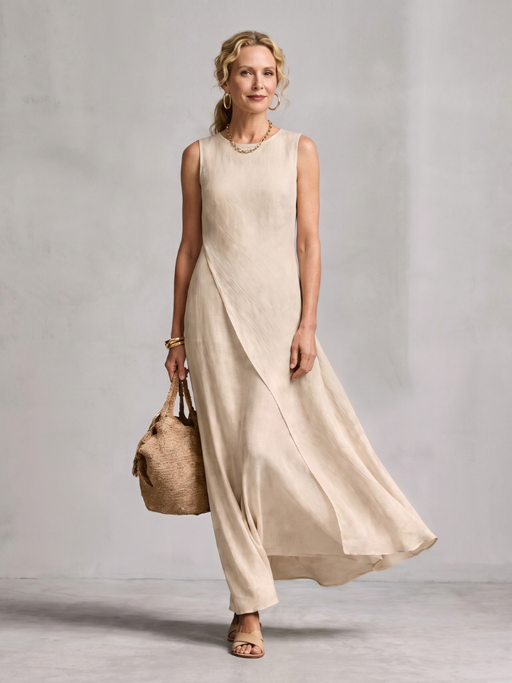 Women's flowy asymmetric layered maxi dress with round neck, sleeveless design, perfect for summer.