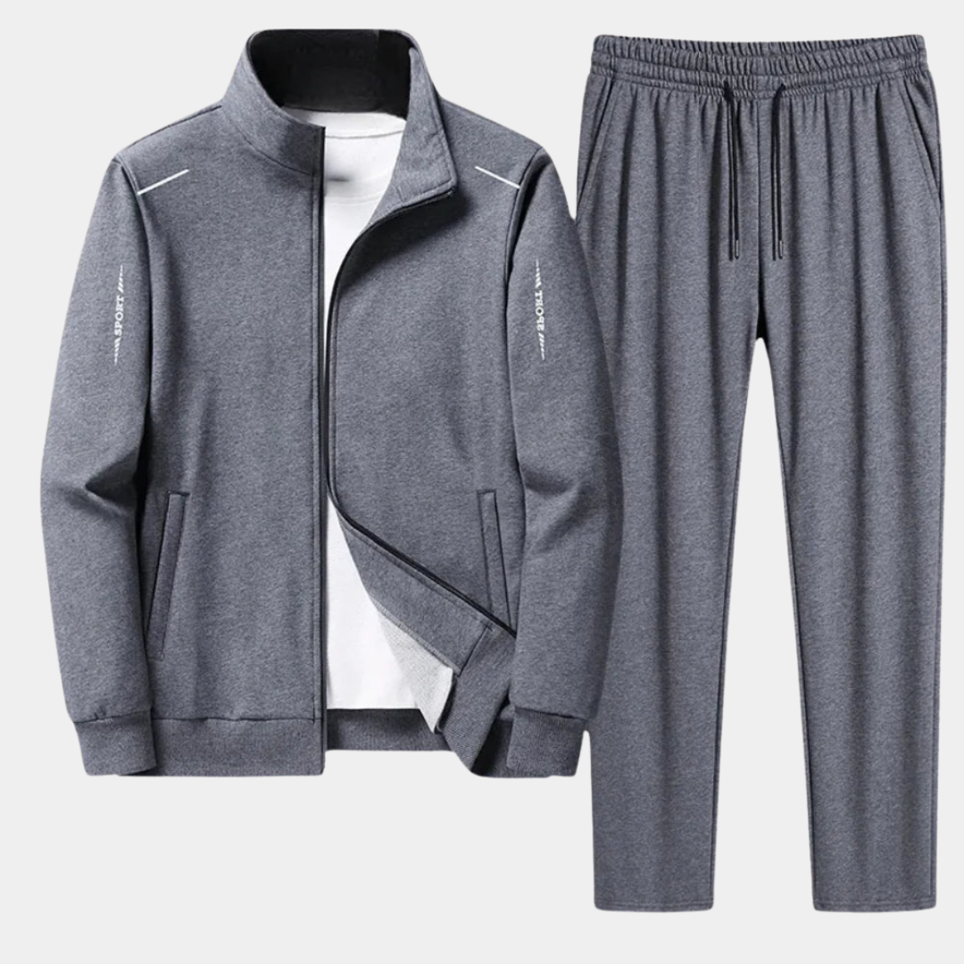 Premium men's tracksuit set. Soft hoodie and flexible sweatpants deliver comfort and style for active or casual fashion.