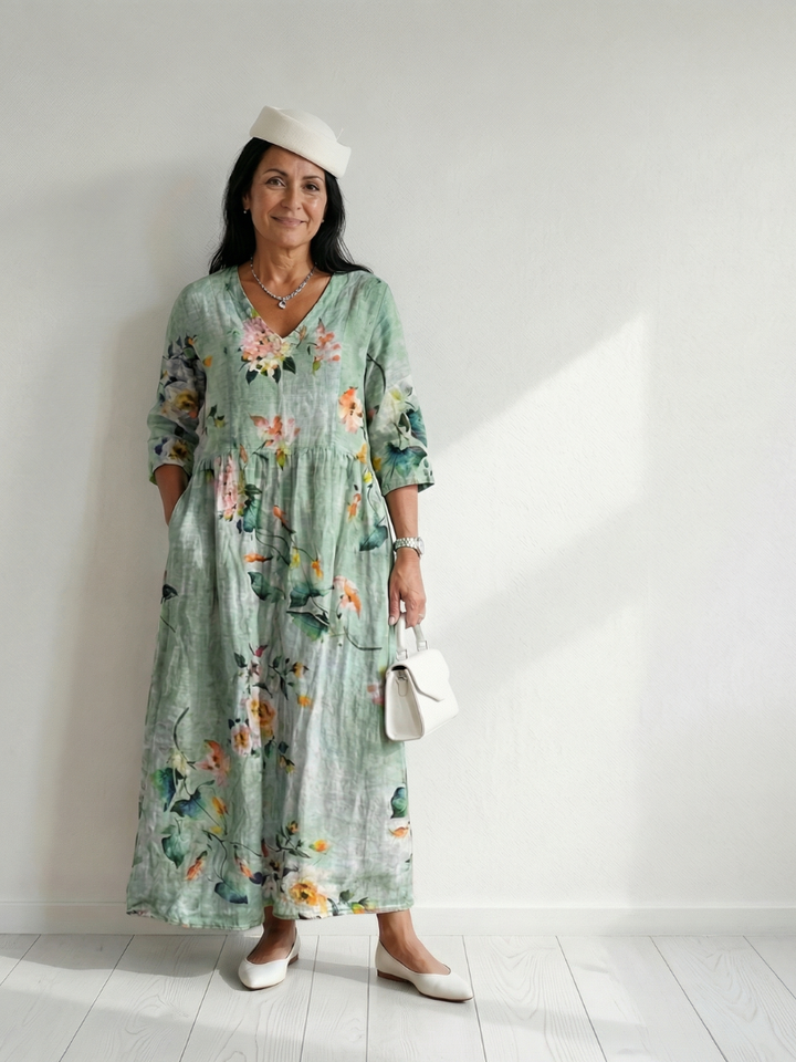 Women's sage green floral midi dress, v-neck, long sleeve, relaxed fit, perfect for spring/summer.